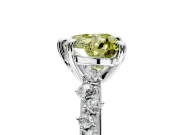 Solitaire Engagement Ring Setting for Fancy Yellow Heart-Shaped Center with Trailing Leaf Accent Band and Prong Head in Sterling Silver