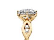 Solitaire Engagement Ring Setting for Radiant Cut Center with Accented Twist Band and Leaf Prong Head in Yellow Gold