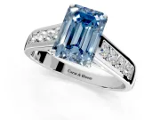 Solitaire Engagement Ring Setting for Fancy Blue Emerald Cut Center with Cathedral Channel Band and Prong Head in Platinum