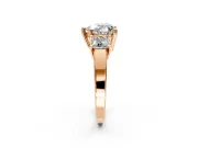 3 Stone Engagement Ring Setting for Heart-Shaped Center with Matching Side Accents and Prong Head in Rose Gold