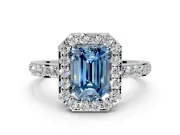 Halo Engagement Ring Setting for Fancy Blue Emerald Cut Center with Heart-Shaped Openwork, Pave Band and Prong Head in Sterling Silver