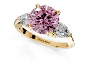 3 Stone Engagement Ring Setting for Fancy Pink Round Cut Center with Large Pear-Shaped Accents and Prong Head in Yellow Gold