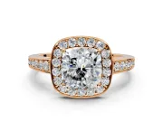 Bezel-Framed Halo Engagement Ring Setting for Cushion Cut Center with Pave Band and Prong Head in Rose Gold