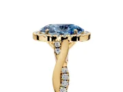 Halo Engagement Ring Setting for Fancy Blue Oval Center with Twist Band and Prong Head in Yellow Gold
