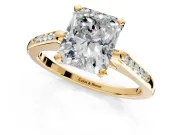 Solitaire Engagement Ring Setting for Radiant Cut Center with Channel Accents and Prong Head in Yellow Gold