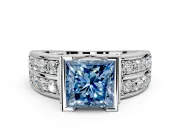 Bezel Engagement Ring Setting for Fancy Blue Princess Cut Center with Wide Channel-Set Band and Bezel Head in Platinum