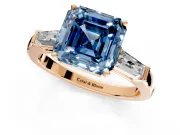 3 Stone Engagement Ring Setting for Fancy Blue Asscher Cut Center with Tapered Baguettes, Plain Band and Prong Head in Rose Gold
