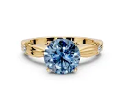 Solitaire Engagement Ring Setting for Fancy Blue Round Cut Center with Carved Leaf Shoulders and Prong Head in Yellow Gold