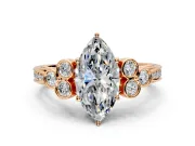 Cluster Engagement Ring Setting for Marquise Center with Bezel Accent Clusters and Prong Head in Rose Gold