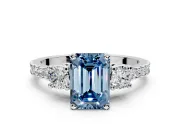 3 Stone Engagement Ring Setting for Fancy Blue Emerald Cut Center with Round Cut Side Accents and Prong Head in White Gold