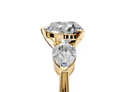 3 Stone Engagement Ring Setting for Heart-Shaped Center with Large Pear-Shaped Accents and Prong Head in Yellow Gold