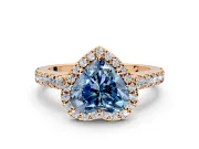 Halo Engagement Ring Setting for Fancy Blue Heart-Shaped Center with Full Pave Band and Prong Head in Rose Gold