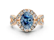 Halo Engagement Ring Setting for Fancy Blue Oval Center with Pave Infinity Twist Band and Prong Head in Rose Gold