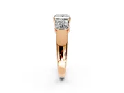 3 Stone Engagement Ring Setting for Princess Cut Center with Raised Basket Heads and Prong Head in Rose Gold