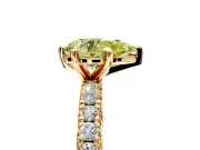 Solitaire Engagement Ring Setting for Fancy Yellow Pear-Shaped Center with Shared-Prong Accents and Prong Head in Yellow Gold