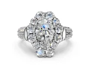 Large Accent Halo Engagement Ring Setting for Pear-Shaped Center with Pave Split Shank and Prong Head in White Gold