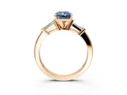 3 Stone Engagement Ring Setting for Fancy Blue Radiant Cut Center with Channel Baguette Accents and Prong Head in Rose Gold