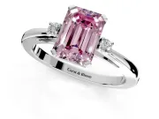 3 Stone Engagement Ring Setting for Fancy Pink Emerald Cut Center with Low-Set Round Cut Accents and Prong Head in White Gold