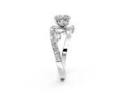 Solitaire Engagement Ring Setting for Cushion Cut Center with Pave Bypass Twist Band and Prong Head in White Gold