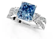 3 Stone Engagement Ring Setting for Fancy Blue Radiant Cut Center with Pave Twist Band and Prong Head in Platinum