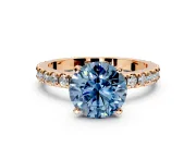 Solitaire Engagement Ring Setting for Fancy Blue Round Cut Center with Fine Pave Band and Claw Prong Head in Rose Gold