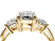 3 Stone Engagement Ring Setting for Emerald Cut Center with Matching Side Accents and Prong Head in Yellow Gold