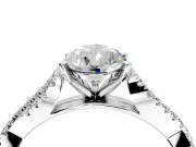 Solitaire Engagement Ring Setting for Pear-Shaped Center with Twisted Pave Split Shank and Prong Head in Platinum