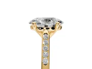 Solitaire Engagement Ring Setting for Oval Center with Channel Accents and Prong Head in Yellow Gold