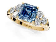 Cluster Engagement Ring Setting for Fancy Blue Asscher Cut Center with Round Cut Accent Frame and Prong Head in Yellow Gold