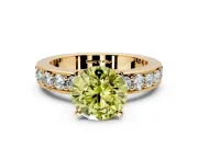 Solitaire Engagement Ring Setting for Fancy Yellow Round Cut Center with Channel-Set Accents and Prong Head in Yellow Gold