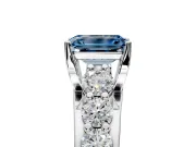 Solitaire Engagement Ring Setting for Fancy Blue Emerald Cut Center with Graduated Shared Prongs and Prong Head in White Gold