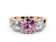 3 Stone Engagement Ring Setting for Fancy Pink Round Cut Center with Raised Basket Heads and Prong Head in Rose Gold