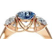 3 Stone Engagement Ring Setting for Fancy Blue Round Cut Center with Raised Basket Heads and Prong Head in Rose Gold