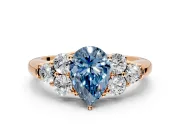 Cluster Engagement Ring Setting for Fancy Blue Pear-Shaped Center with Round Cut Accent Frame and Prong Head in Rose Gold