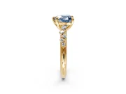 Solitaire Engagement Ring Setting for Fancy Blue Heart-Shaped Center with Trailing Leaf Accent Band and Prong Head in Yellow Gold