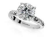 Solitaire Engagement Ring Setting for Round Cut Center with XO Engraved Band and Prong Head in Platinum