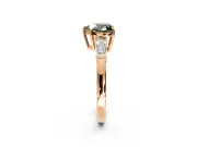 3 Stone Engagement Ring Setting for Fancy Green Heart-Shaped Center with Baguette Accents and Prong Head in Rose Gold