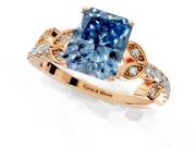 Leaf Motif Engagement Ring Setting for Fancy Blue Radiant Cut Center with Pave Band and Prong Head in Rose Gold