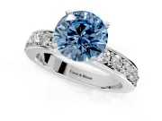 Solitaire Engagement Ring Setting for Fancy Blue Round Cut Center with Channel-Set Accents and Prong Head in Platinum