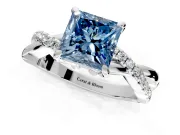 Solitaire Engagement Ring Setting for Fancy Blue Princess Cut Center with Half-Pave Crossover Band and Prong Head in Platinum