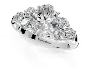 Cluster Engagement Ring Setting for Oval Center with Round Cut Accent Frame and Prong Head in Platinum