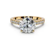 Solitaire Engagement Ring Setting for Round Cut Center with Crossover Accents and Prong Head in Yellow Gold