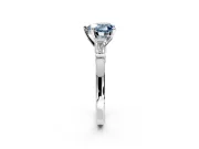 3 Stone Engagement Ring Setting for Fancy Blue Heart-Shaped Center with Channel Baguette Accents and Prong Head in Platinum