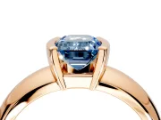 Tension Engagement Ring Setting for Fancy Blue Emerald Cut Center with Wide Flat Band and Tension Head in Rose Gold