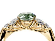 Cluster Engagement Ring Setting for Fancy Green Oval Center with Round Cut Accent Frame and Prong Head in Yellow Gold