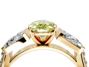 Channel-Set Engagement Ring Setting for Fancy Yellow Pear-Shaped Center with Baguette Band and Prong Head in Yellow Gold