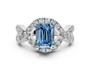 Halo Engagement Ring Setting for Fancy Blue Emerald Cut Center with Pave Infinity Twist Band and Prong Head in Sterling Silver