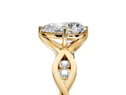 Solitaire Engagement Ring Setting for Pear-Shaped Center with Accented Twist Band and Leaf Prong Head in Yellow Gold