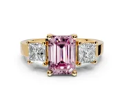 3 Stone Engagement Ring Setting for Fancy Pink Emerald Cut Center with Matching Side Accents and Prong Head in Yellow Gold