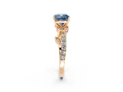 Leaf Motif Engagement Ring Setting for Fancy Blue Cushion Cut Center with Pave Band and Prong Head in Rose Gold